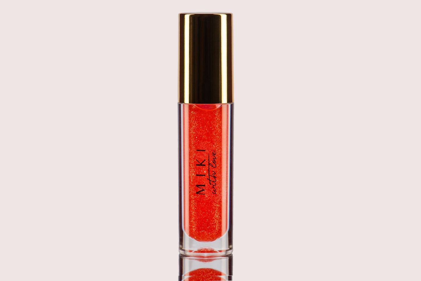 juicy coral high shine lip loss with glitter miki with love cosmetics